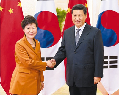 习近平会见马来西亚总理安瓦尔